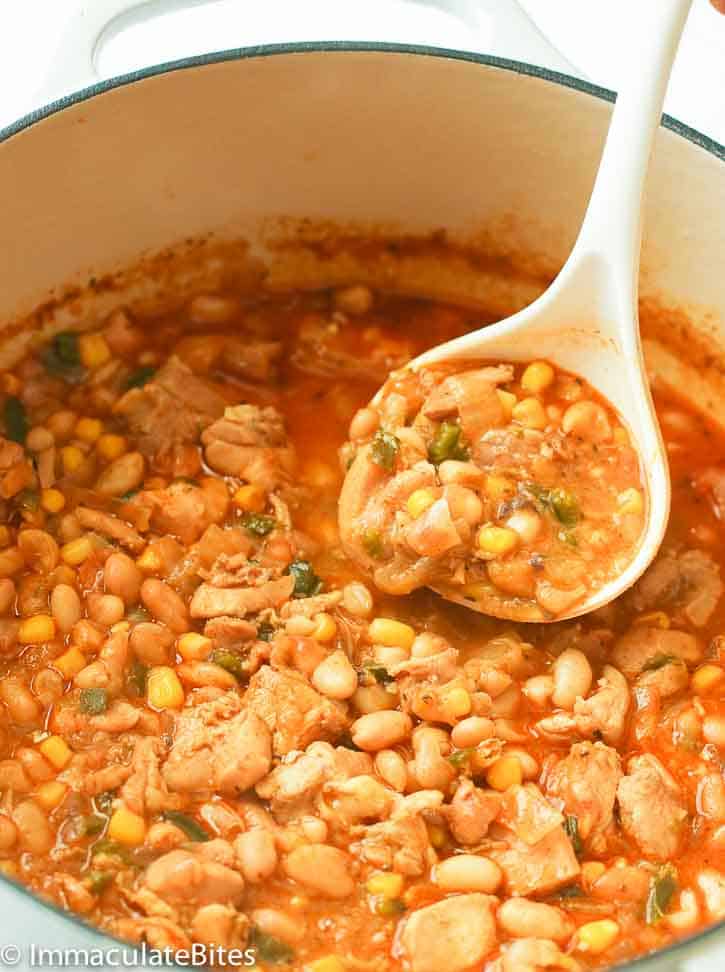 Serving soul food white bean chicken chili