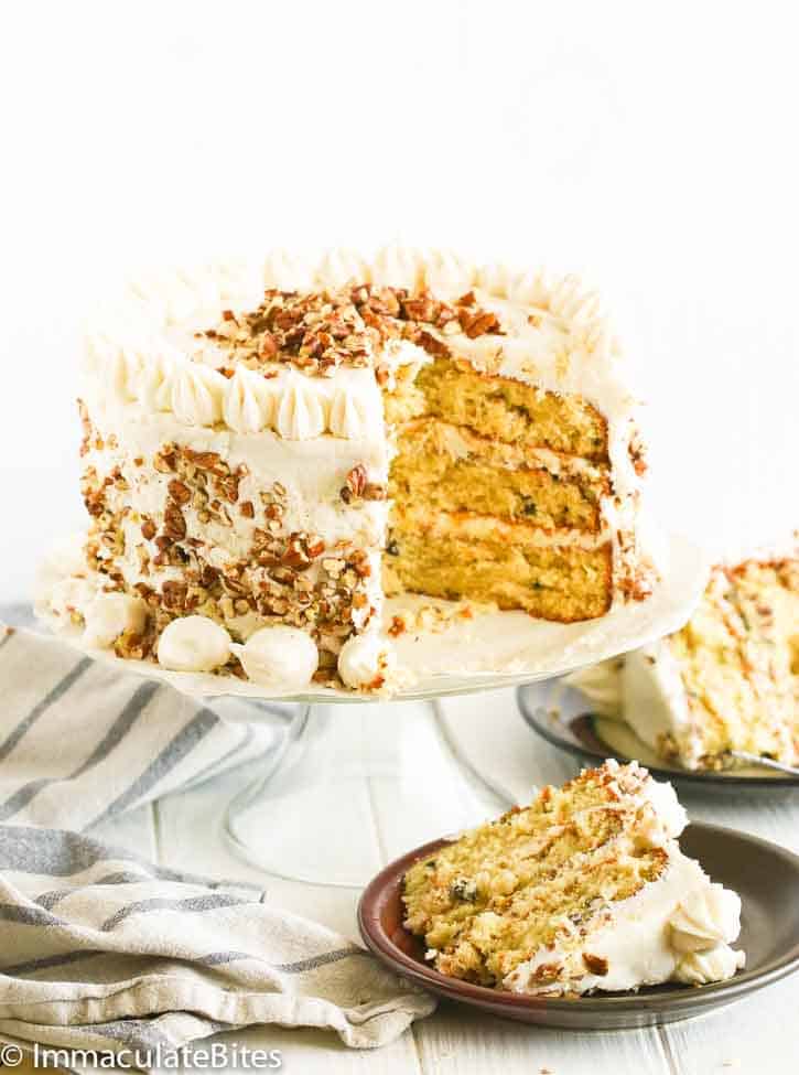 Sliced Italian Cream Cake on a cake stand