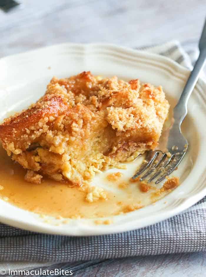 A square of French toast bake on a white plate. A great way to use coconut milk