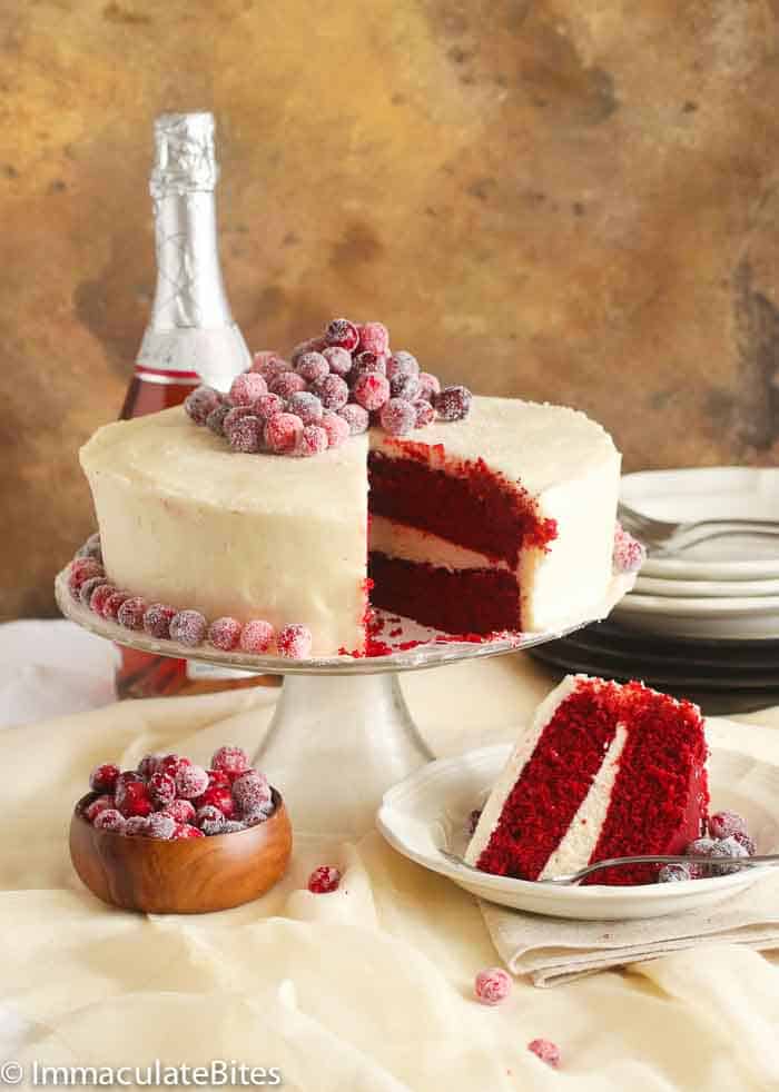 Red velvet Cake with a Slice on a Serving Plate