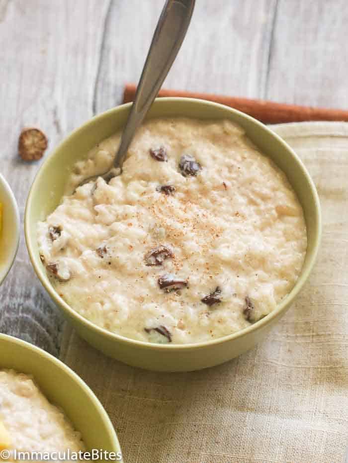A Bowl of Rice Pudding with Raisins and Cinnamon