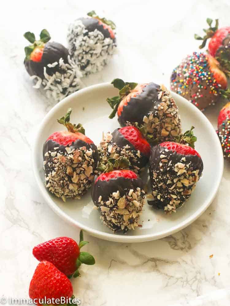 Chocolate recipes featuring chocolate covered-strawberries on a plate