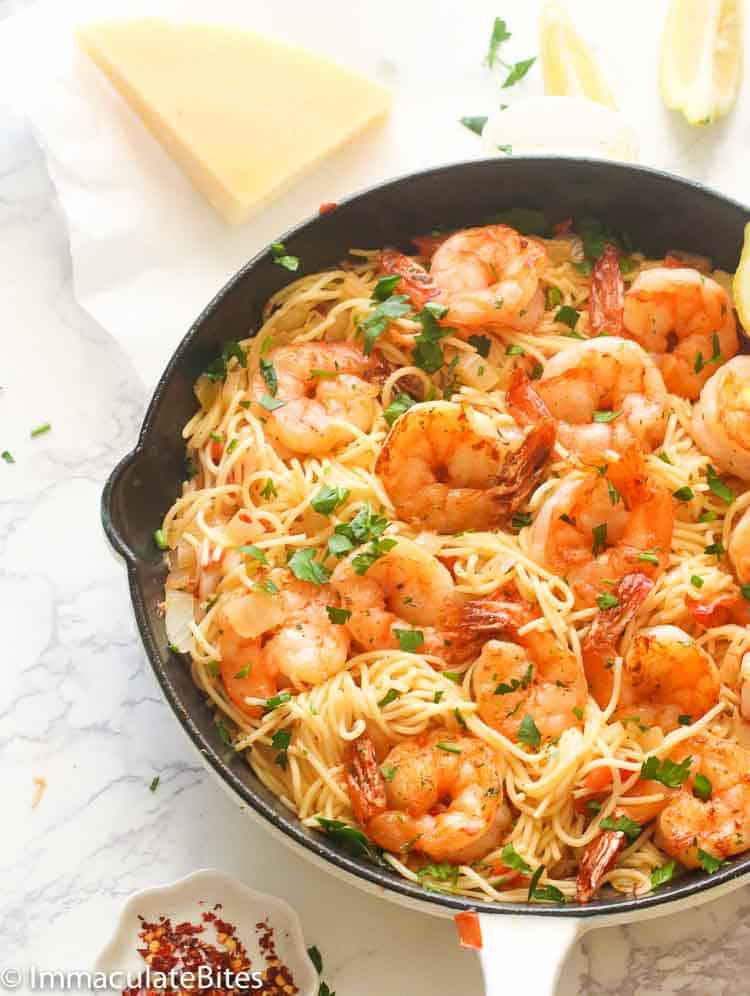 Pasta on a Skillet Topped with Shrimp
