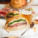 Muffaletta sandwich with a beer is a classic New Orleans specialty