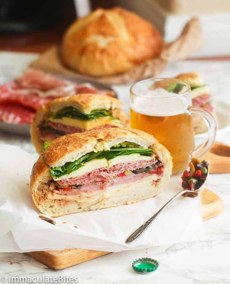Muffaletta sandwiches served with beer are a New Orleans specialty.