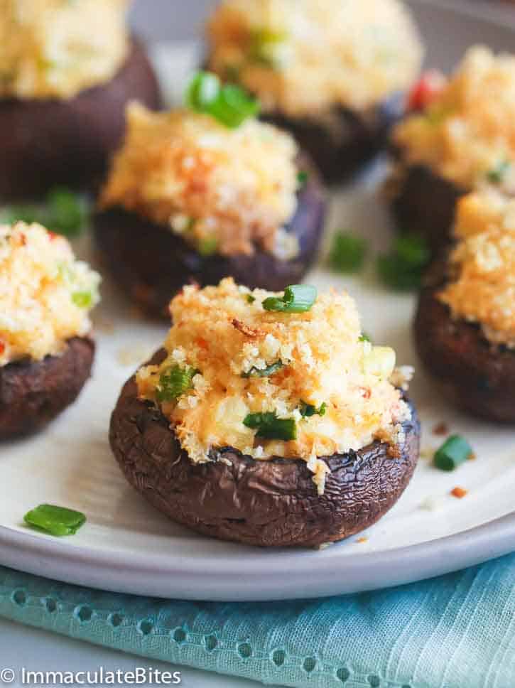 Yummy Crab Stuffed Mushrooms Garnished with Spring Onion Slices