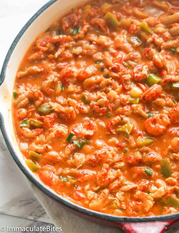 closeup shot of freshly cooked crawfish etouffee in a skillet