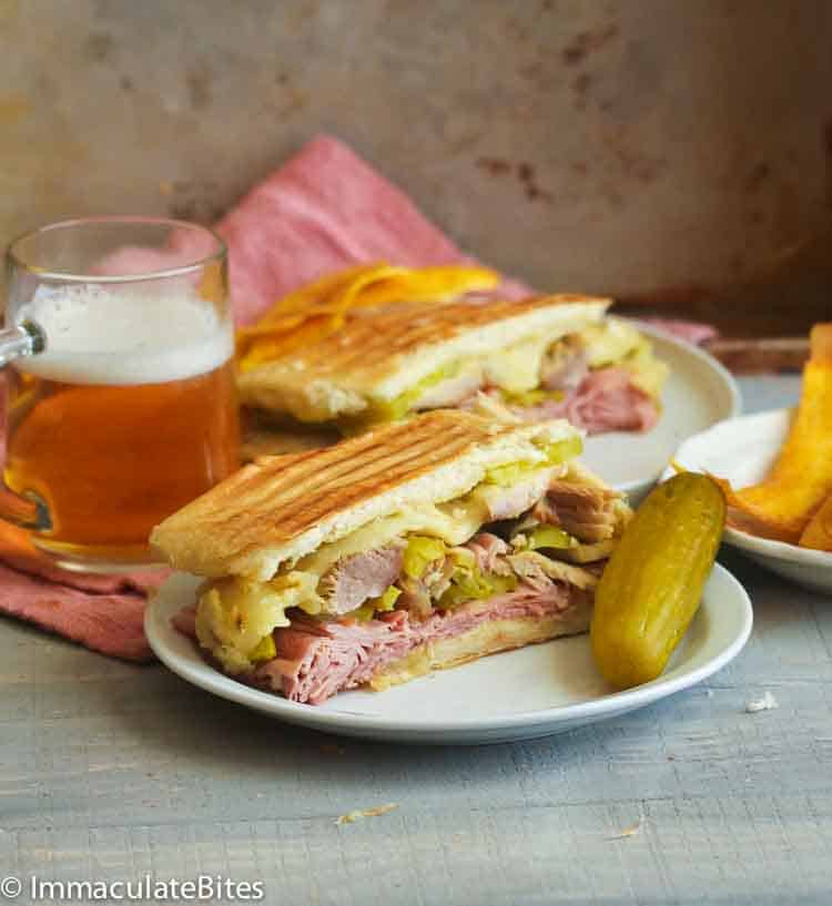 Serving up a delicious Cuban sandwich with a pickle on the side for your next Super Bowl
