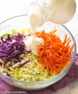 Drizzling creamy coleslaw dressing over a freshly made salad for the perfect cookout side