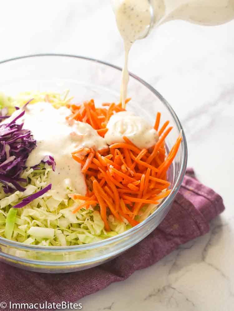 Drizzling your finished creamy coleslaw dressing over a healthy and delicious coleslaw