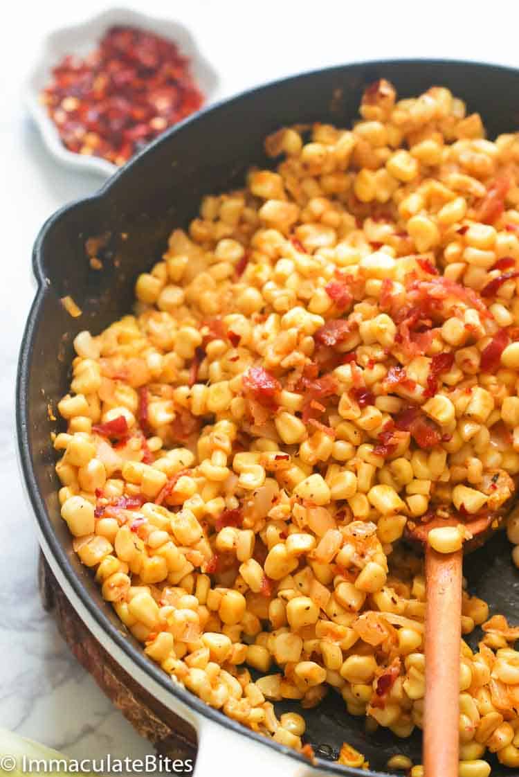 A skillet full of deliciously fried corn