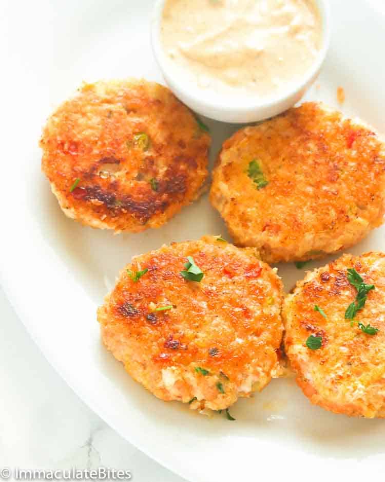 Soul-satisfying Salmon patties fresh off the skillet with a side of delicious remoulade