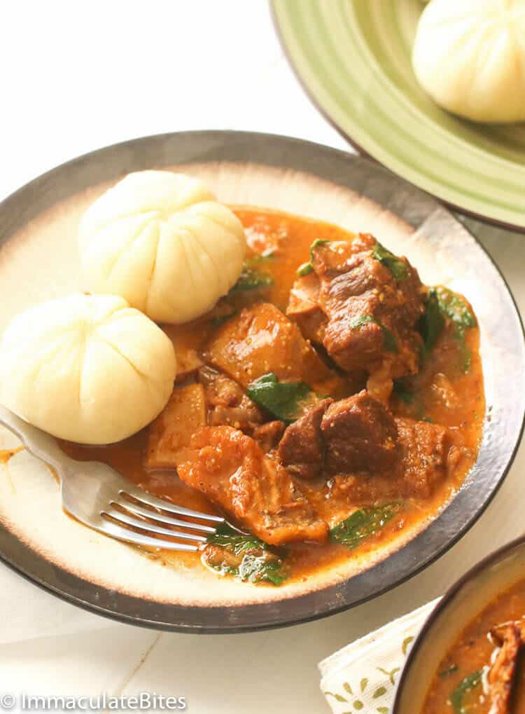 A bowl of ogbono soup with pounded yams