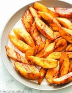 Fried Plantain Cut smaller on white plate