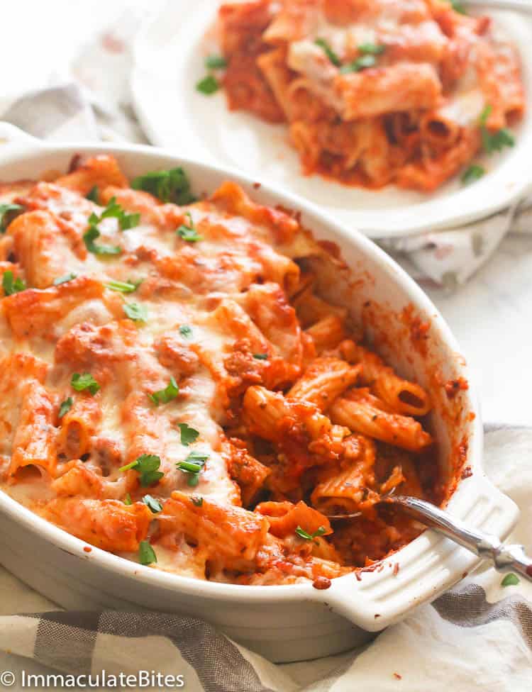 Baked ziti being served on a plate