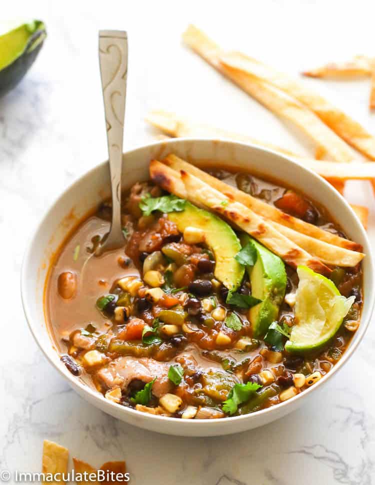 A Bowl of Chicken Tortilla Soup Topped with Tortilla Strips