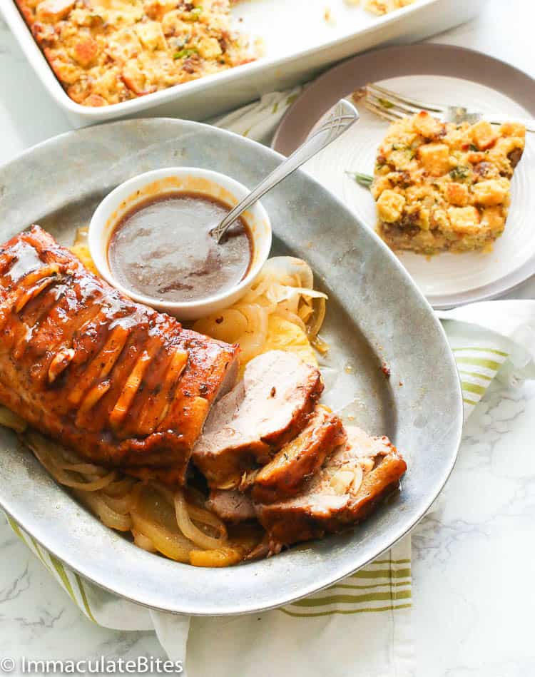 Sliced Slow Cooker Pork Loin served with Sauce