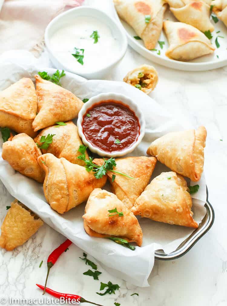 A Platter of Samosas Served with Ketchup