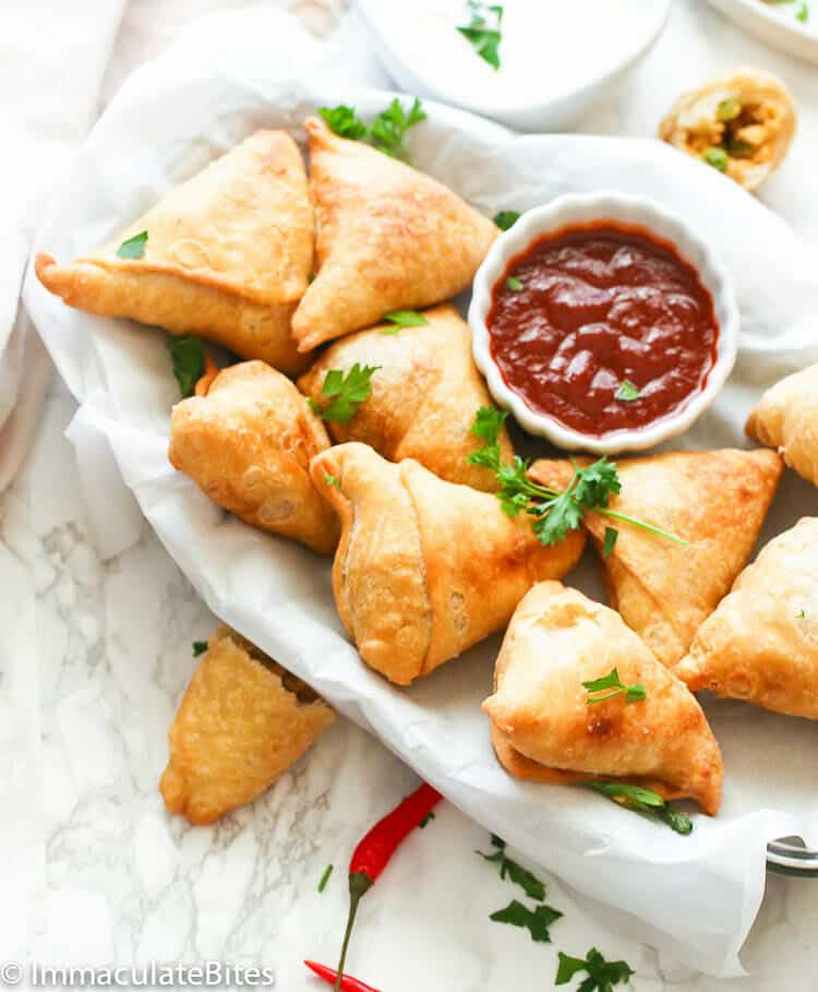 Samosas with dipping sauce for a decadent appetizer
