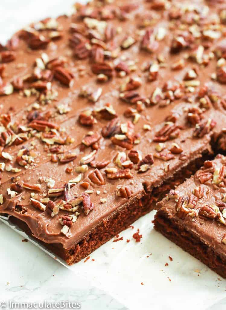 Texas sheet cake topped with pecans