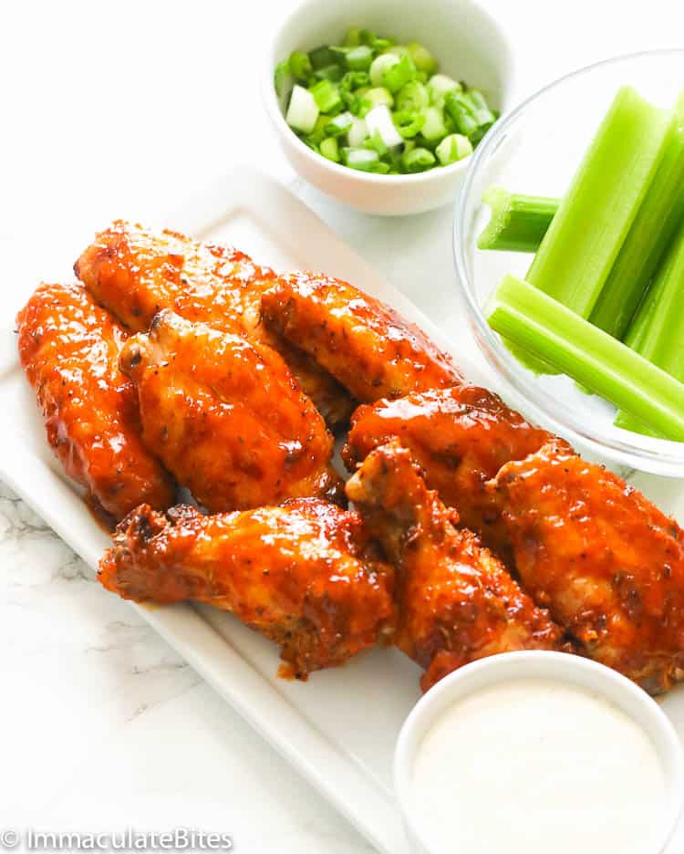 Sweet and spicy buffalo chicken wings with remoulade sauce