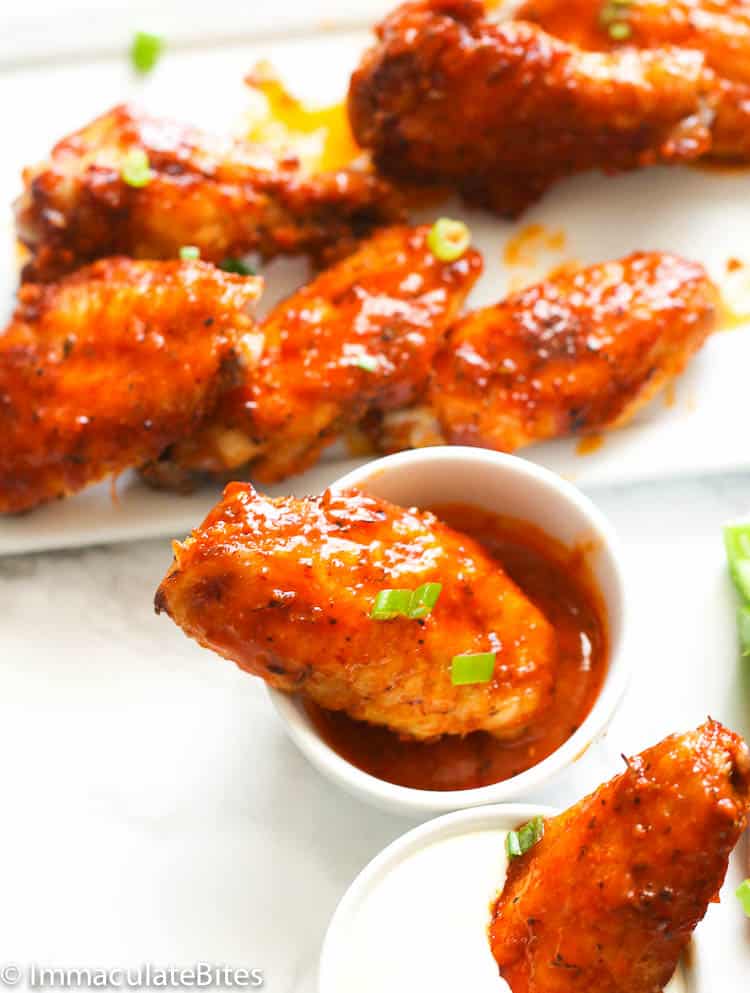 Buffalo Chicken Wing Dipped in Hot Sauce