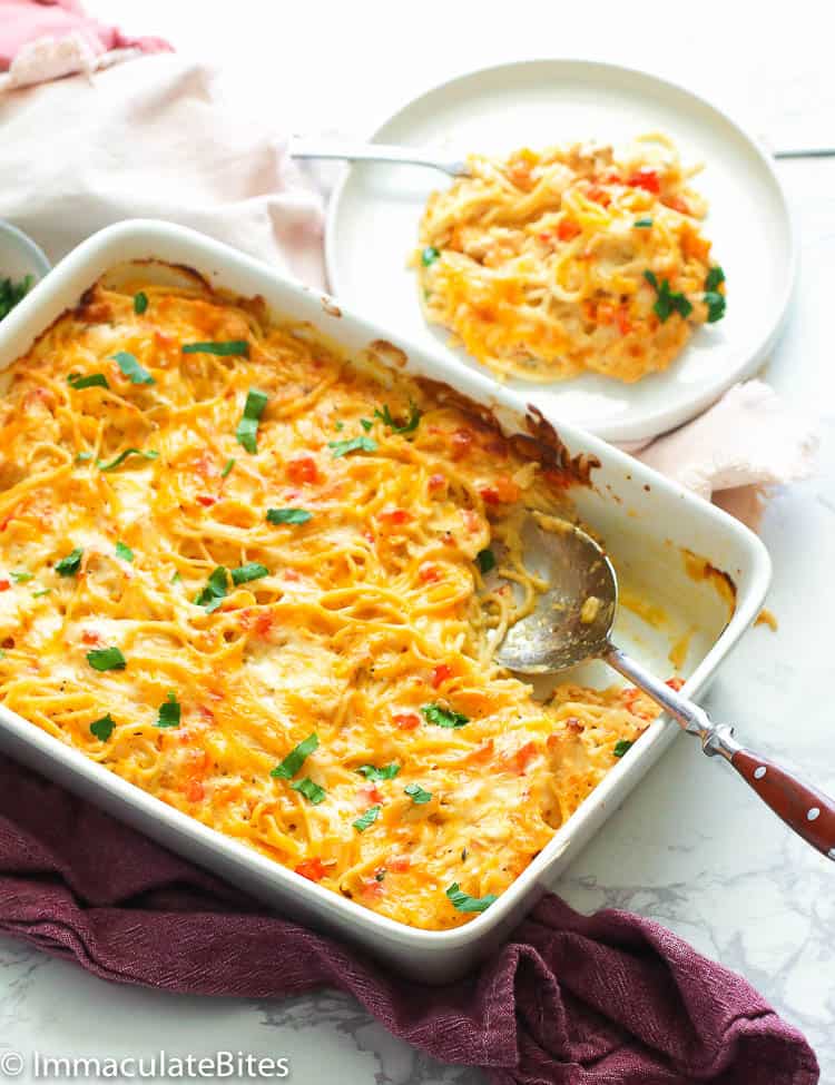 Baked chicken spaghetti in a white dish