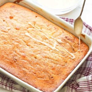 Honey Bun Cake being glazed