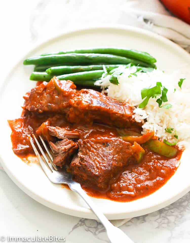 Swiss Steak Served with White Rice and Green Beans