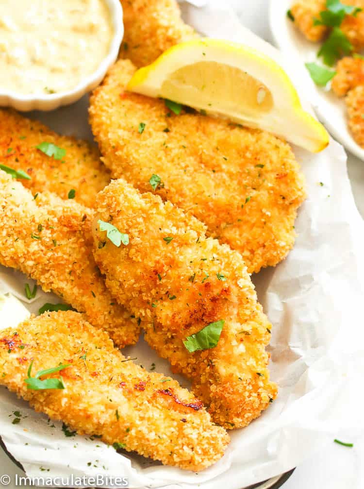 Baked Chicken Tenders Served with a Slice of Lemon