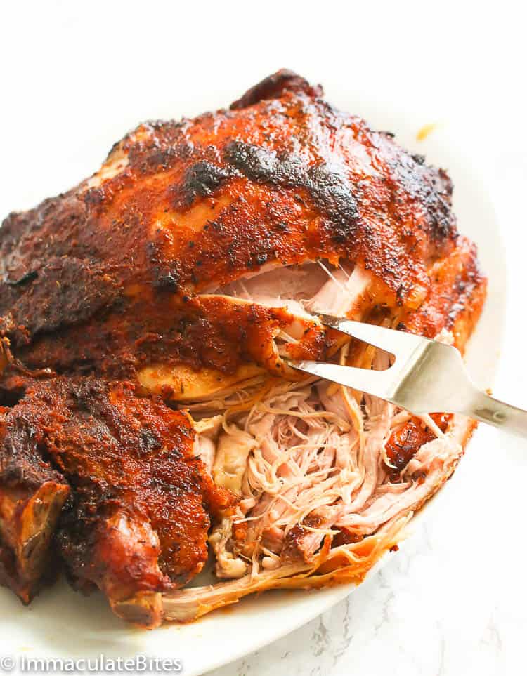 Pulled Pork Recipe Being Torn Apart with a Fork