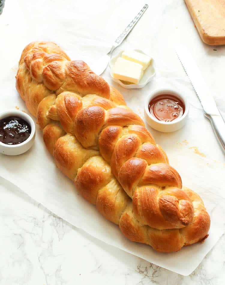 Challah Bread hot from the oven with honey and butter