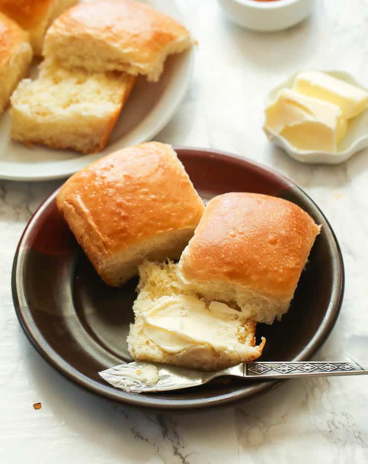 Sliced Dinner Roll Smothered with Butter