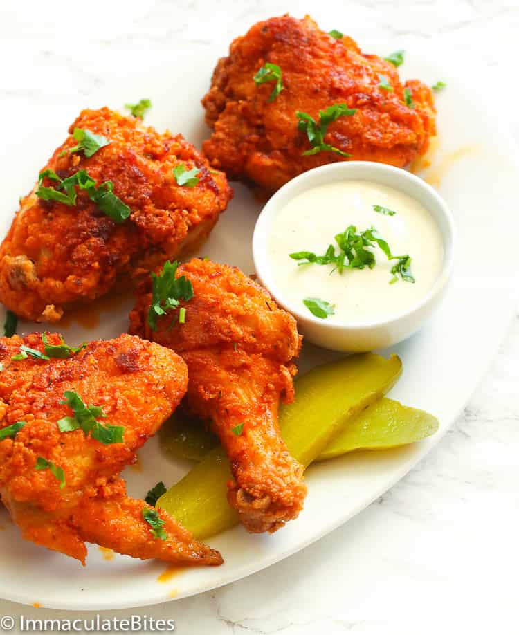 Serving up ridiculously delicious Nashville hot chicken with pickles and remoulade