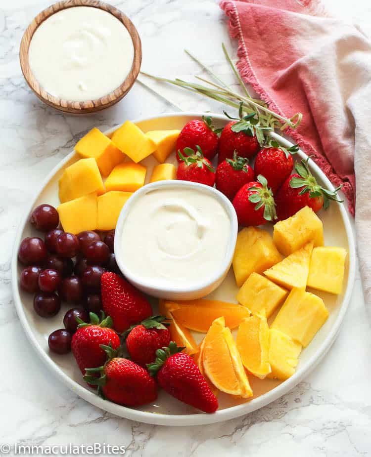 Serving up a fruit tray with cream cheese fruit dip for a summery delight