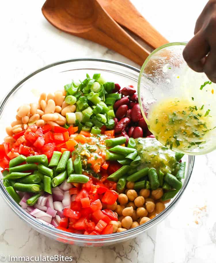 A bowl of three-bean salad with herb-infused dressing