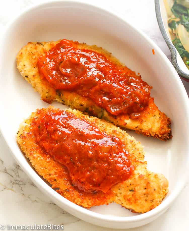 Chicken parmesan in a while platter