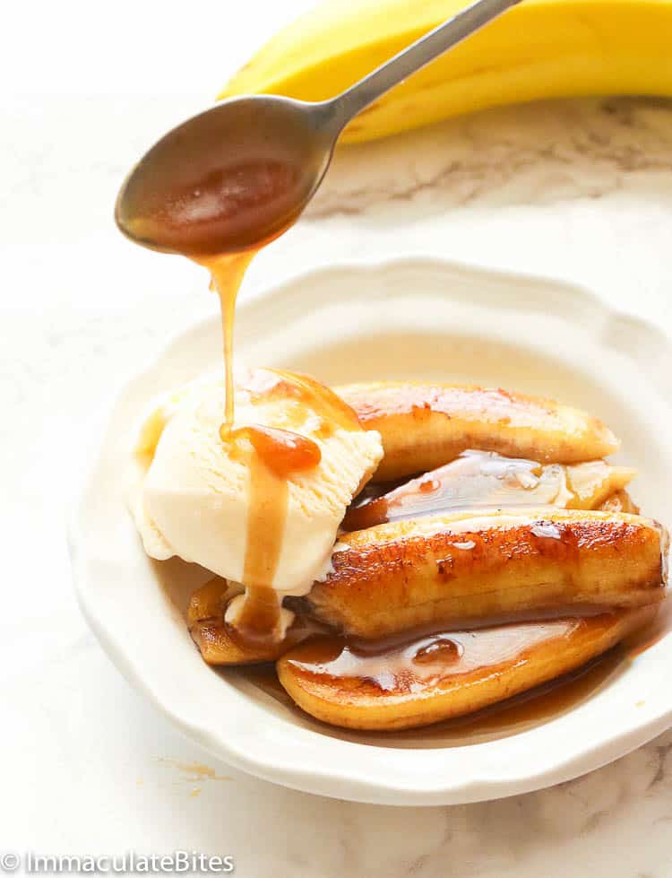 Banana foster served with a scoop of vanilla ice cream on top
