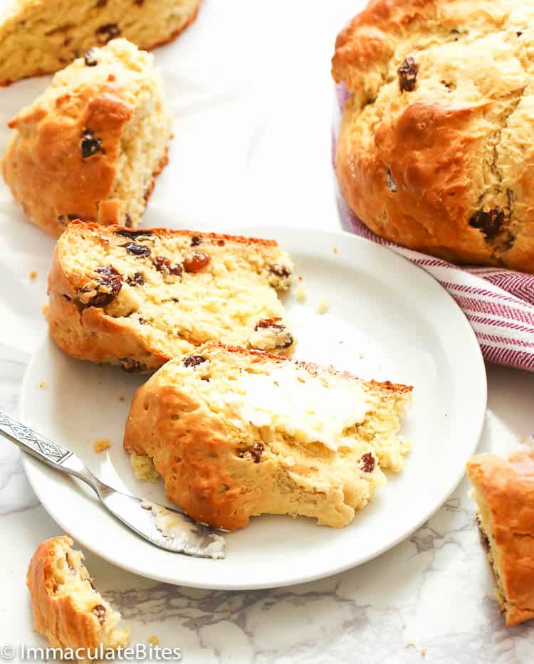 Sliced Irish Soda Bread slathered with Butter