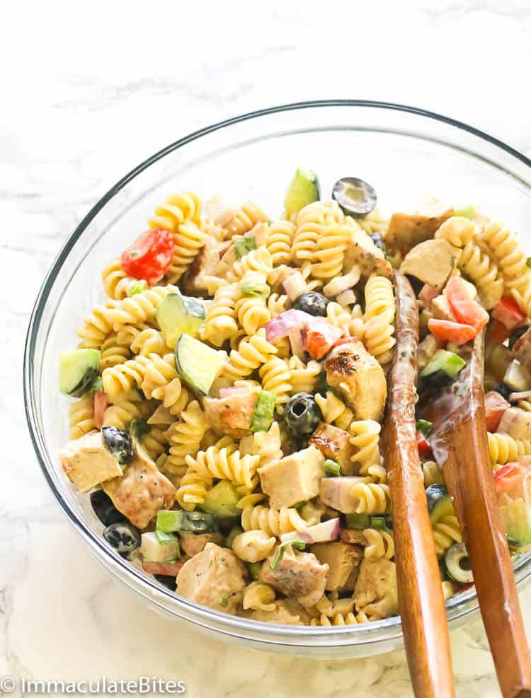 creamy chicken pasta salad in a clear bowl