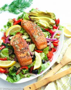 Salmon in a bed of colorful veggies