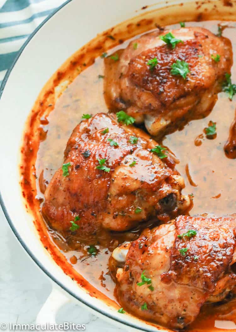 Honey Mustard chicken thighs in white skillet