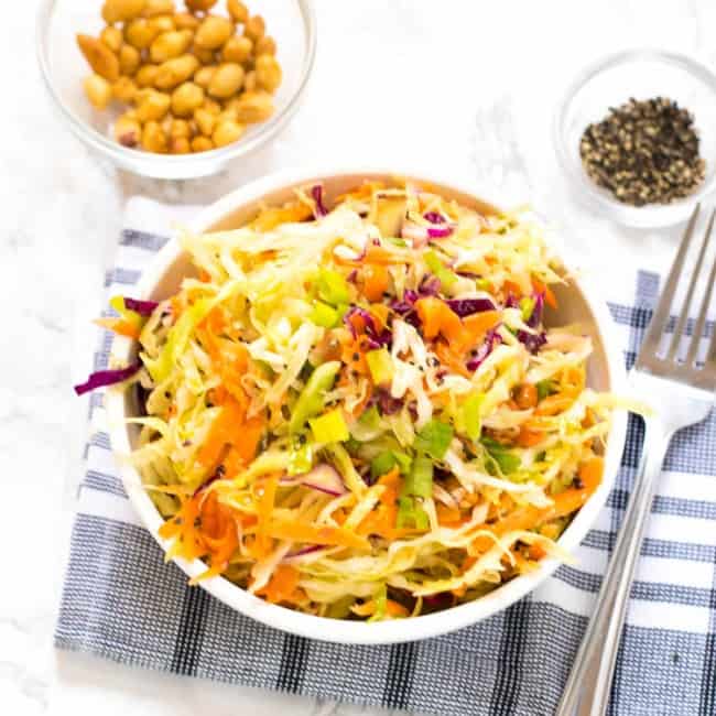 Vinegar coleslaw in a white bowl