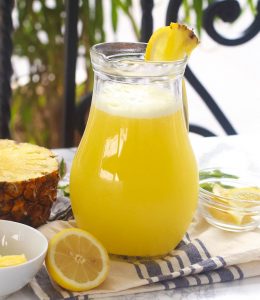 A cold pitcher of refreshing homemade pineapple juice ready to serve