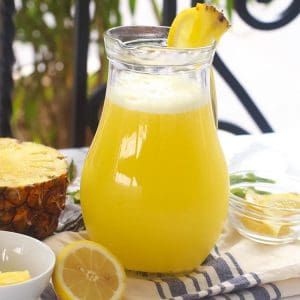 A cold pitcher of refreshing homemade pineapple juice ready to serve