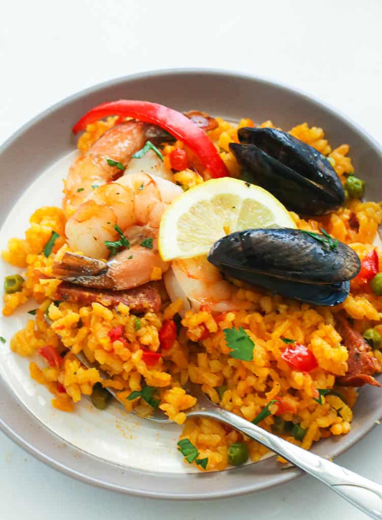 Seafood Paella served with lemon