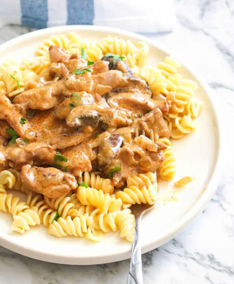 Chicken Stroganoff served over egg noodles