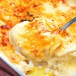 Cheesy Potatoes au Gratin in a scoop