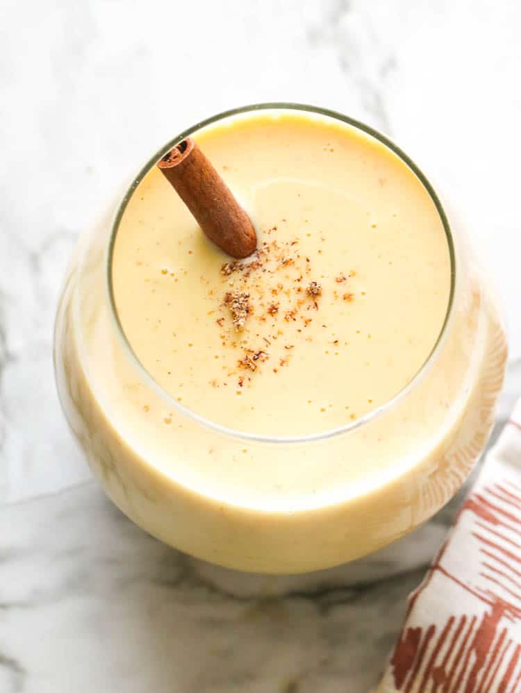 A Glass of Homemade Eggnog Served with Cinnamon Stick