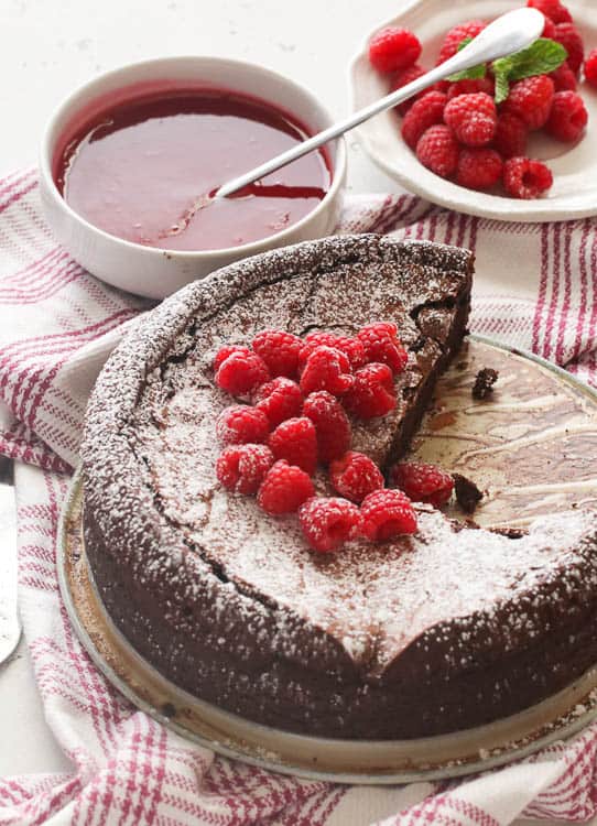 Flourless chocolate cake with raspberry toppings